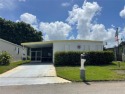 Absolutely beautiful 2/2 double wide on one of the best views of for sale in Davie Florida Broward County County on GolfHomes.com