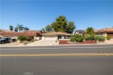 WATERFRONT living on the jump lagoon.  Peaceful, serene for sale in Canyon Lake California Riverside County County on GolfHomes.com