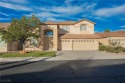 Experience refined living in this elegant 4-bedroom, 3-bath for sale in Las Vegas Nevada Clark County County on GolfHomes.com