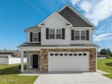 Designed with family living in mind, this home has a thoughtful for sale in Ayden North Carolina Pitt County County on GolfHomes.com