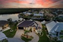 Incredible SUNSETS & LONG WATER VIEWS of the RIM CANAL await for sale in Punta Gorda Florida Charlotte County County on GolfHomes.com