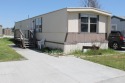 Check out this great 2 bed, 1 bath manufactured home close to for sale in Spokane Washington Spokane County County on GolfHomes.com