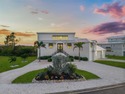Experience exceptional coastal living in this custom 2023 home for sale in Englewood Florida Charlotte County County on GolfHomes.com