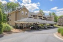 Enjoy low-maintenance living in this furnished second-floor unit for sale in Clayton Georgia Rabun County County on GolfHomes.com