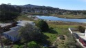 This listing includes two adjacent parcels located on a quiet for sale in Los Osos California San Luis Obispo County County on GolfHomes.com