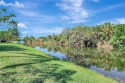 Enjoy a peaceful lake view from your glass enclosed lanai.  This for sale in Naples Florida Collier County County on GolfHomes.com