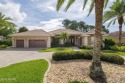 Beautifully remodeled 4BR/3BA home in the exclusive gated golf for sale in Daytona Beach Florida Volusia County County on GolfHomes.com
