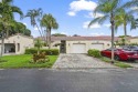 Experience  Florida lifestyle in this beautifully maintained for sale in Deerfield Beach Florida Broward County County on GolfHomes.com