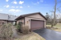 Carefree Lake Michigan townhouse offers one floor living with for sale in Michigan City Indiana Laporte County County on GolfHomes.com