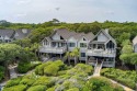 Discover an extraordinary coastal retreat in this beautifully for sale in Kiawah Island South Carolina Charleston County County on GolfHomes.com