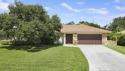 Welcome to Paradise as you enter this 1-story 3/2 pool home for sale in Tequesta Florida Martin County County on GolfHomes.com