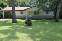 Welcome to 606 Dove Ln, a delightful traditional-style home for sale in Horseshoe Bend Arkansas Izard County County on GolfHomes.com