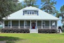 Welcome to your coastal retreat with panoramic marsh views along for sale in Townsend Georgia Mcintosh County County on GolfHomes.com