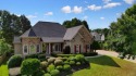 Step into refined comfort in this beautifully updated Bridgemill for sale in Canton Georgia Cherokee County County on GolfHomes.com