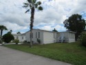 2005 Palm Harbor mobile home with a large (12x20) Florida room for sale in Port Saint Lucie Florida Saint Lucie County County on GolfHomes.com