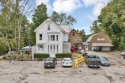 This exceptional property offers 5 residential units and a for sale in Farmington New Hampshire Strafford County County on GolfHomes.com