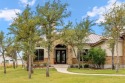 This beautiful Mediterranean home has a large open floor plan for sale in Kerrville Texas Kerr County County on GolfHomes.com