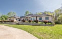 This exceptional luxury residence blends timeless elegance and for sale in Bloomington Indiana Monroe County County on GolfHomes.com