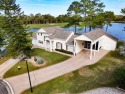 This beautiful 2 Bedroom/2.5 bath home overlooks Bass Lake and for sale in Titusville Florida Brevard County County on GolfHomes.com