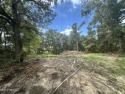 Gulf Hills Waterfront .44 acre lot. Neighborhood amenities for sale in Ocean Springs Mississippi Jackson County County on GolfHomes.com
