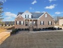 Welcome to a golfer's paradise! This stunning brick estate for sale in Winston Georgia Douglas County County on GolfHomes.com