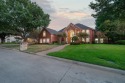 This fabulous custom home on Walnut Creek golf course sits on for sale in Mansfield Texas Tarrant County County on GolfHomes.com