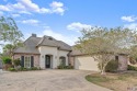 Beautiful French style home located in prestigious Greystone for sale in Denham Springs Louisiana Livingston Parish County on GolfHomes.com