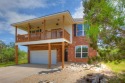 Experience the ultimate in lakeside living at this stunning home for sale in Graford Texas Palo Pinto County County on GolfHomes.com