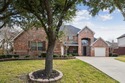 BEAUTIFUL custom home located in prestigious Woodbridge Golf for sale in Sachse Texas Collin County County on GolfHomes.com