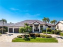 You will absolutely LOVE this spectacular canal front 4-5 BR for sale in Punta Gorda Florida Charlotte County County on GolfHomes.com
