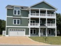 Luxury Living In COROLLA NC! Just under 6,000sqft of living for sale in Corolla North Carolina Currituck County County on GolfHomes.com