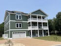 $25,000 BUYER CREDIT AT CLOSING on this just under 6,000sqft of for sale in Corolla North Carolina Currituck County County on GolfHomes.com