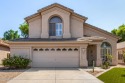 Welcome to your charming lakefront retreat! This warm, inviting for sale in Glendale Arizona Maricopa County County on GolfHomes.com