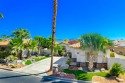 The beautifully relandscaped front yard with faux grass, exotic for sale in Palm Desert California Riverside County County on GolfHomes.com