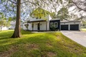 One or more photo(s) has been virtually staged. Stunning modern for sale in Alachua Florida Alachua County County on GolfHomes.com