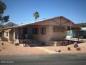 Very nice well cared for fully furnished home with Ramada roof for sale in Tucson Arizona Pima County County on GolfHomes.com