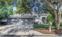 Welcome to this bright and inviting 5-bedroom, 3-bath, and 3-car for sale in Tampa Florida Hillsborough County County on GolfHomes.com