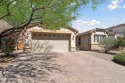 This single-story home in the gated Omni Tucson National resort for sale in Tucson Arizona Pima County County on GolfHomes.com
