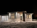SELLER IS OFFERING $10,000 TOWARD 2/1 RATE BUYDOWN! Contemporary for sale in Bigfork Montana Flathead County County on GolfHomes.com