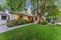 Tucked beneath the dappled shade of mature trees, this for sale in Riverside California Riverside County County on GolfHomes.com