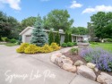 Experience turnkey lake-area living in this beautifully updated, Indiana
