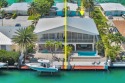 This well-maintained 2 Bedroom, 2 Bath elevated canal front half for sale in Key Colony Beach Florida Monroe County County on GolfHomes.com