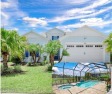 Tropical-inspired Coconut model single-family pool & spa home for sale in Daytona Beach Florida Volusia County County on GolfHomes.com