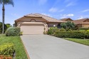 Well maintained 2 bed, 2 1/2 bath + DEN home With peaceful golf for sale in Palm City Florida Martin County County on GolfHomes.com