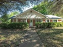 This three-bedroom, two-bathroom home is brimming with potential for sale in Hillsboro Texas Hill County County on GolfHomes.com