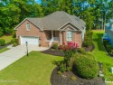 Nestled in a prestigious gated golf community, this brick home for sale in Calabash North Carolina Brunswick County County on GolfHomes.com