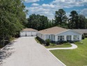 Stunning, like-new (2023), custom built, 4-bedroom, 3-bathroom for sale in Surfside Beach South Carolina Horry County County on GolfHomes.com