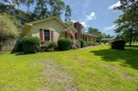 Stunning ranch-style home in River Bend! This one-story offers a for sale in New Bern North Carolina Craven County County on GolfHomes.com