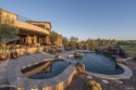 Stunning staycation custom home on gentle sloping elevated lot for sale in Gold Canyon Arizona Pinal County County on GolfHomes.com