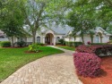 This inviting Queens Harbour waterfront home showcases stunning for sale in Jacksonville Florida Duval County County on GolfHomes.com